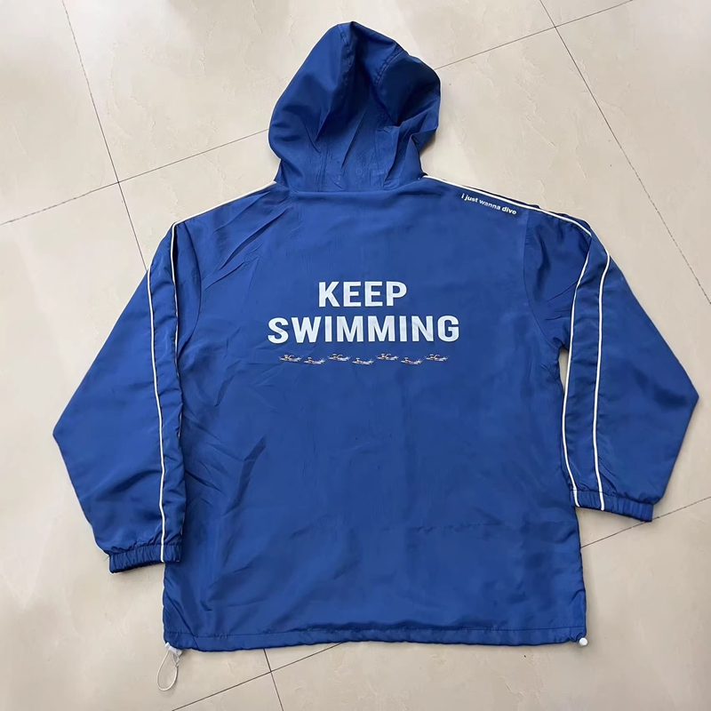 เสื้อแจ็คเก็ตกันลมมีฮู้ดสีน้ำเ - Windbreaker Anime Merchandise บทวิจารณ์และราคา